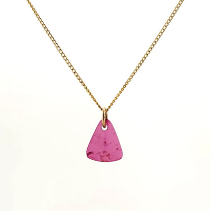 Necklace with a Pink Tourmaline pendant displaying soft pink hues with natural variations, on a white background (front view)