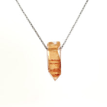 Necklace with a Tangerine Quartz pendant featuring warm orange tones with natural inclusions, on a white background (back view)