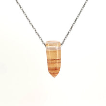 Necklace with a Tangerine Quartz pendant featuring warm orange tones with natural inclusions, on a white background (front view)