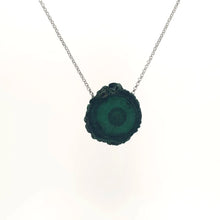 Necklace with a Malachite Stalactite Slice pendant showcasing a natural cross-section of banded green malachite, highlighting concentric growth patterns, on a white background (back view)