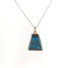 Necklace with a triangular Chrysocolla pendant featuring vibrant shades of blue and green with natural patterns, paired with Sterling Silver and Gold Filled Wire wrap and bail (front view)