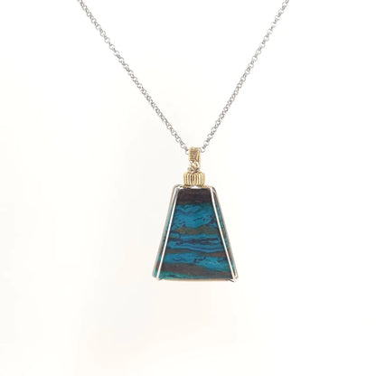 Necklace with a triangular Chrysocolla pendant featuring vibrant shades of blue and green with natural patterns, paired with Sterling Silver and Gold Filled Wire wrap and bail (front view)