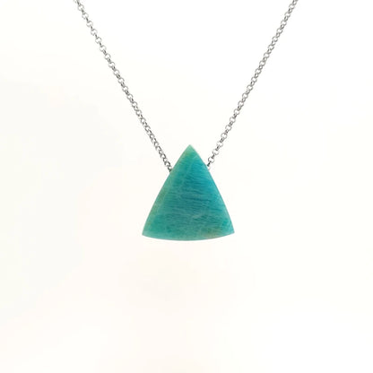 Triangle cut amazonite pendant with natural shades of blue-green on a silver chain against a white background (back view)