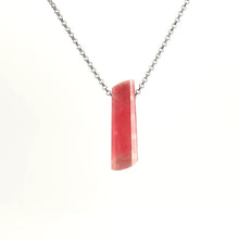 Necklace with a Rhodochrosite pendant displaying soft pink to rose-red tones with natural banding, on a white background (back view)