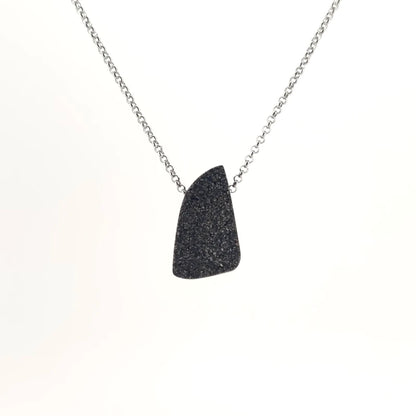 Necklace with a Rutilated Quartz pendant , on a white background (back view)