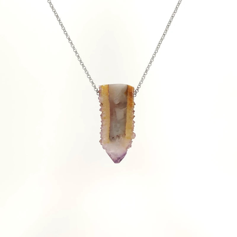 Necklace with a cactus quartz crystal on a white background (back view)