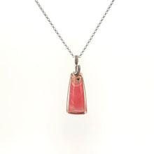 Necklace with Rhodochrosite pendant set in sterling silver wire wrap and bail, on a white background (front view)