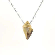 Necklace with a Drusy Fossil Shell pendant combining natural fossil shell with sparkling crystal surfaces, on a white background (back view)