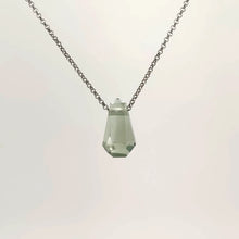 Necklace with a faceted Prasiolite pendant featuring soft green tones, on a white background (back view)