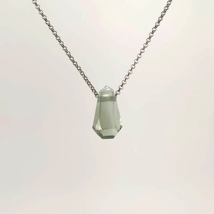 Necklace with a faceted Prasiolite pendant featuring soft green tones, on a white background (front view)