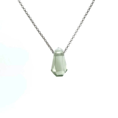 Necklace with a green crystal pendant on a white background