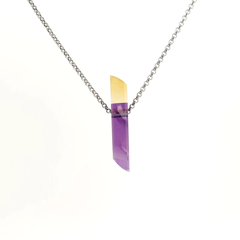 Neckless with amethyst and citrine intarsia on a white background