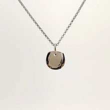 Necklace with a Smokey Quartz pendant featuring a faceted cut that enhances the stone’s deep, smoky brown tones, on a white background (back view)