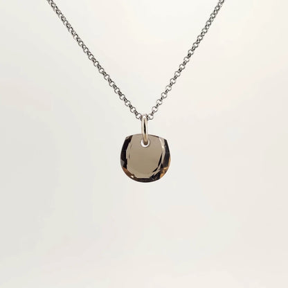Necklace with a Smokey Quartz pendant featuring a faceted cut that enhances the stone’s deep, smoky brown tones, on a white background (back view)