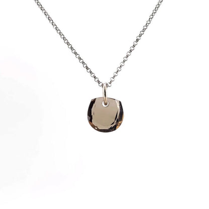 Necklace with a smoky quartz pendant on a white background