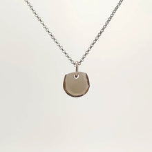 Necklace with a Smokey Quartz pendant featuring a faceted cut that enhances the stone’s deep, smoky brown tones, on a white background (front view)