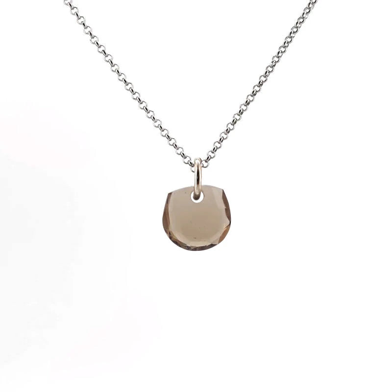 Necklace with a smoky quartz pendant on a white background