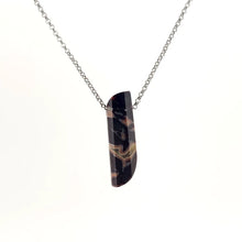 Necklace with a Dryhead Agate pendant showcasing earthy tones with intricate banding patterns, on a white background (back view)