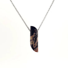Necklace with a Dryhead Agate pendant showcasing earthy tones with intricate banding patterns, on a white background (front view)