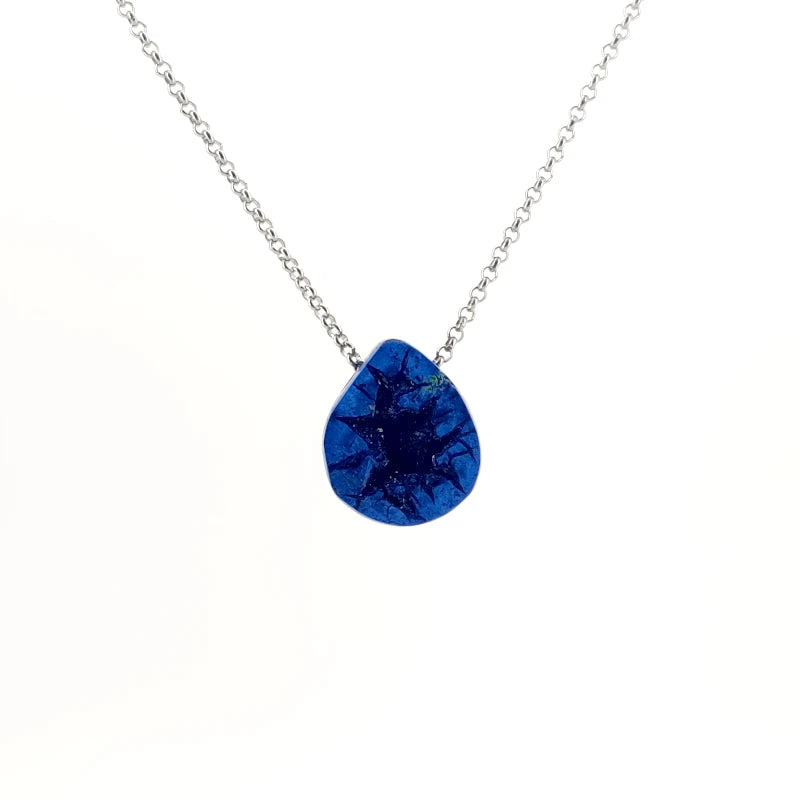 Necklace with a teardrop-shaped Azurite Geode pendant displaying deep blue tones with natural crystal formations inside the geode (front view)