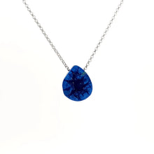 Necklace with a teardrop-shaped Azurite Geode pendant displaying deep blue tones with natural crystal formations inside the geode (front view)