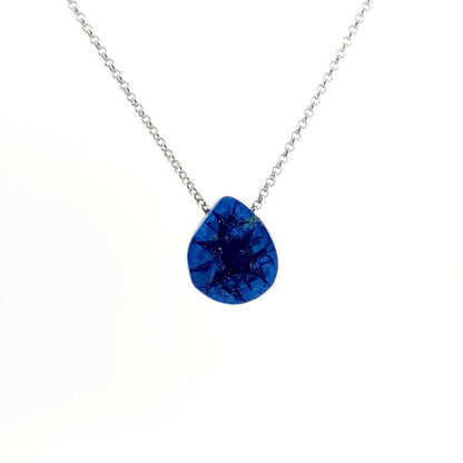 Necklace with a teardrop-shaped Azurite Geode pendant displaying deep blue tones with natural crystal formations inside the geode (front view)