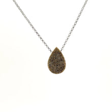 Necklace with a teardrop-shaped Angel Aura Treated Drusy pendant on a white background (back view)