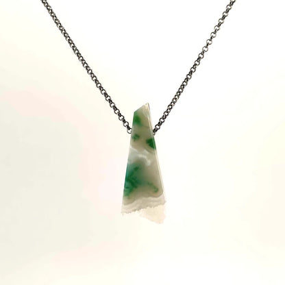 Necklace with a triangular Chrysocolla in White Agate pendant featuring calming blue-green tones framed within creamy white agate (front view)