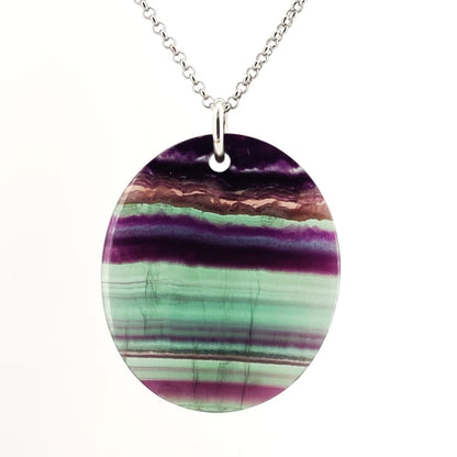 Necklace with a fluorite pendant on a white background