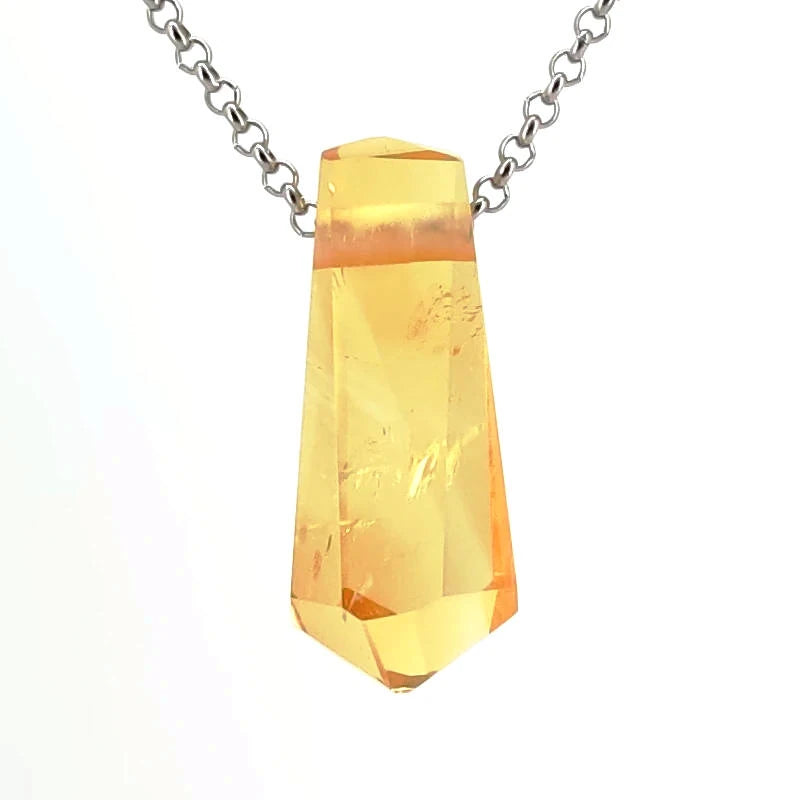 Crystal pendant necklace on a white background