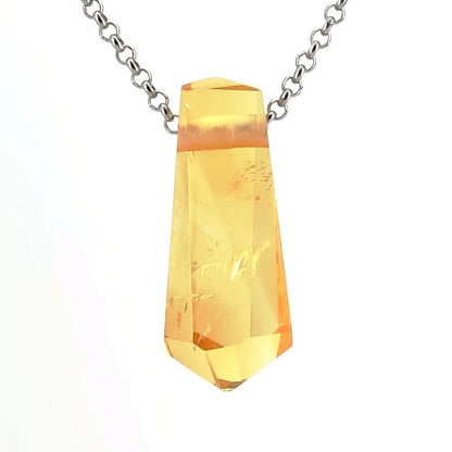 Crystal pendant necklace on a white background