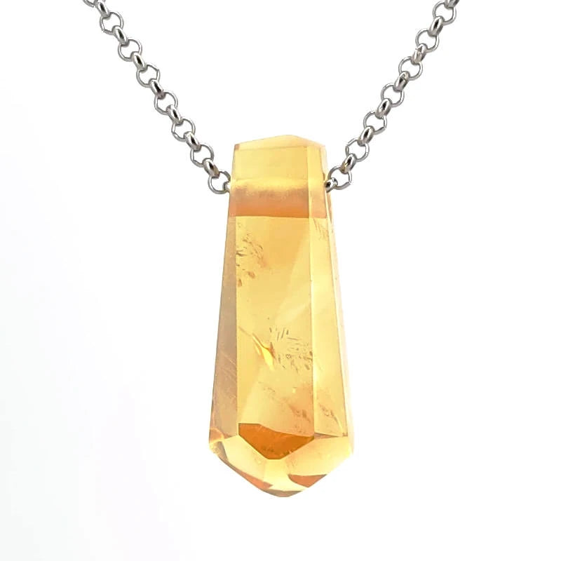 Crystal pendant necklace on a white background