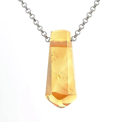 Crystal pendant necklace on a white background