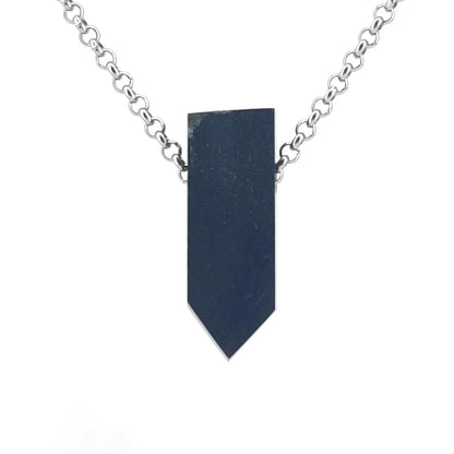 Green drusy garnet pendant on a chain against a white background