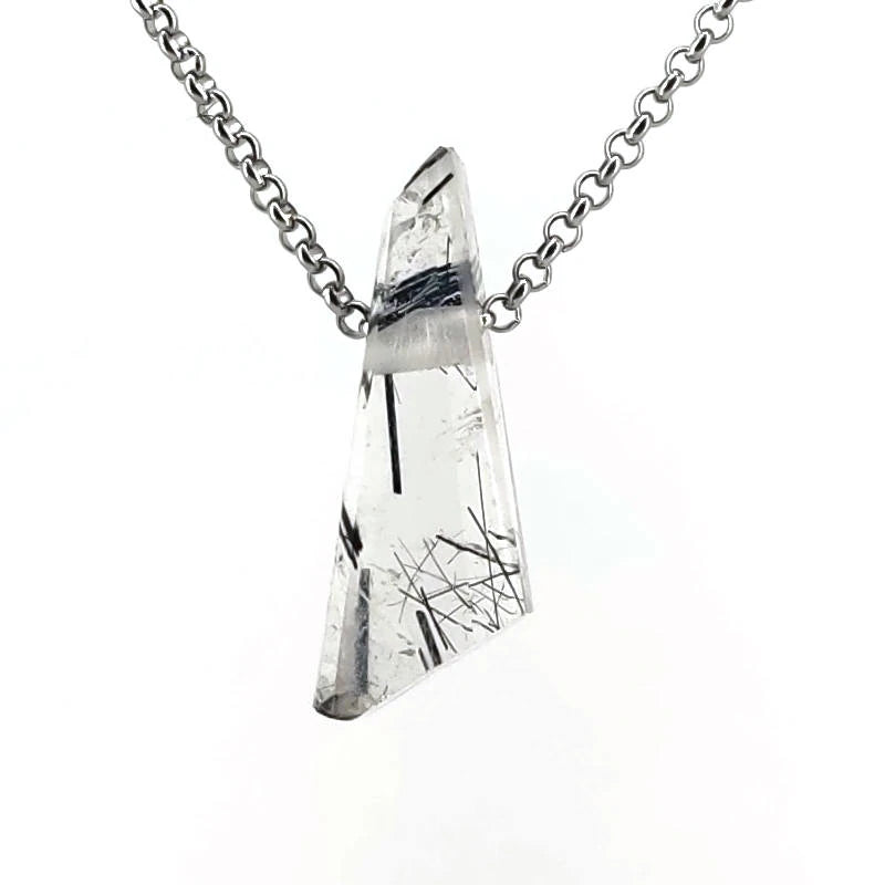 Crystal pendant necklace on a white background