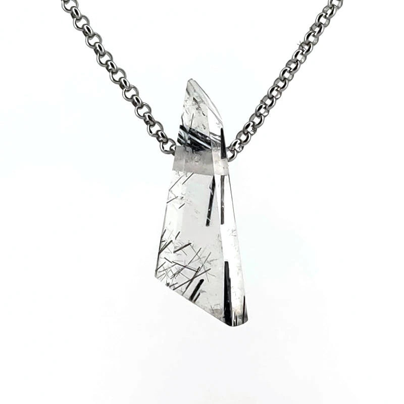 Crystal pendant necklace on a white background