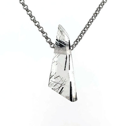 Crystal pendant necklace on a white background