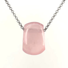 Necklace with a rose quartz pendant on a white background