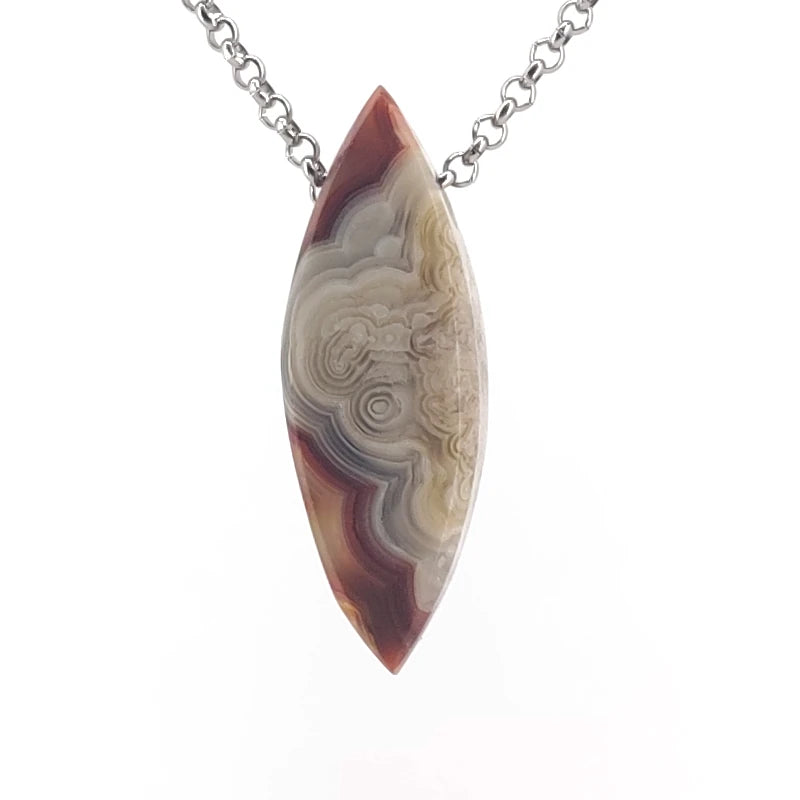 Necklace with a dryhead agate pendant on a white background