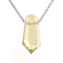 Lemon quartz pendant on a chain against a white background