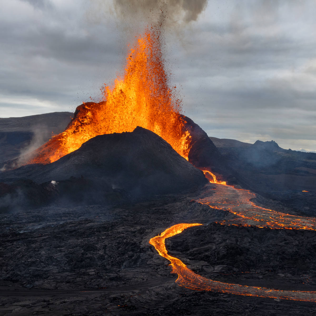 volcano erupting with magma